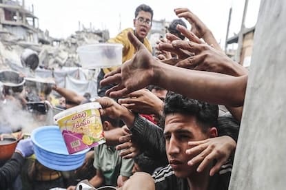 mother and child receiving emergency food assistance