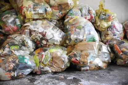 discarded vegetables and food waste in market